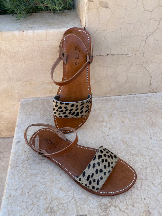 Handmade leather sandals with animal print